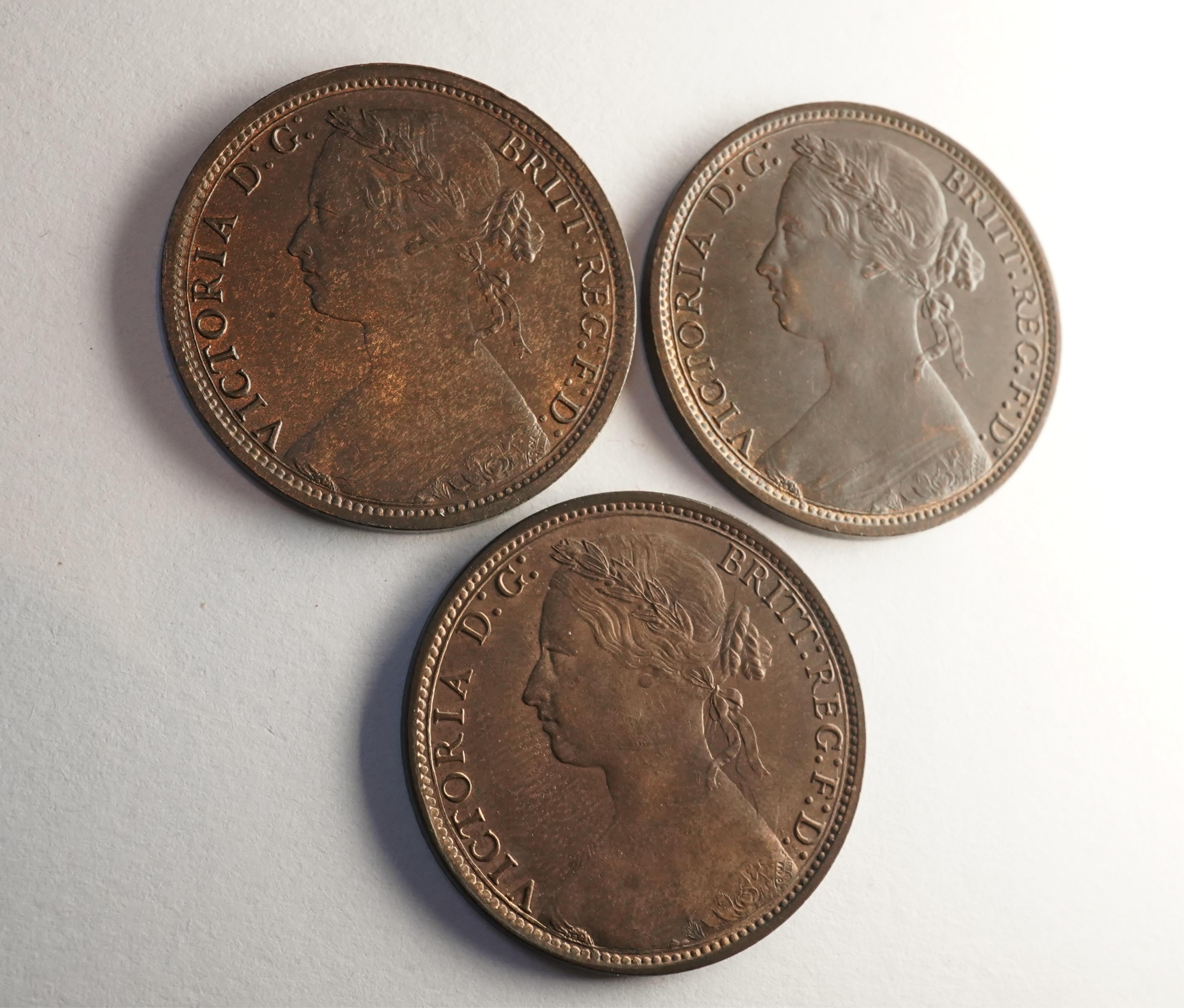 British coins, Victoria, three bronze pennies;, 1874, small date over H, Fr. 73, Gouby dies K/j, good VF, dark toned, 1876, small date over H, Fr. 89, Gouby dies L/m, crisply struck, about UNC, dark toned, patches of lus